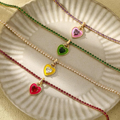 “Close-up of pink heart gold necklace for Valentine’s or Mother’s Day gifting”


